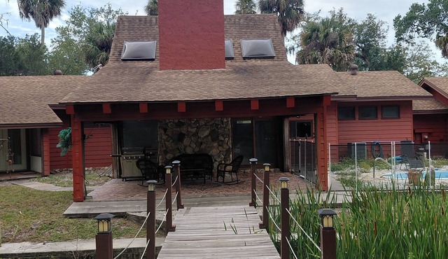 Hidden oasis on 16 quiet acres and a private 6 acre 120' spring fed lake.