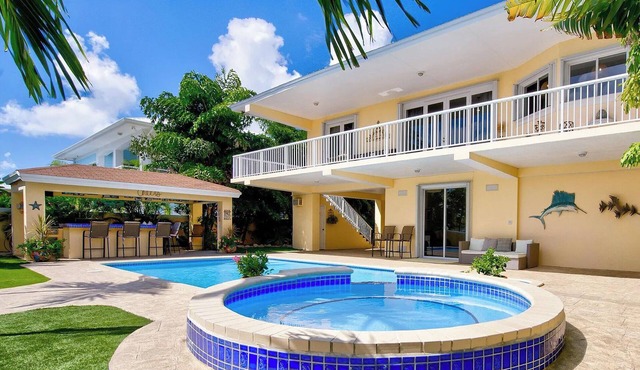 Key Largo Canal Home - Heated Pool, Spa, 36ft Dock, Kayaks & Ocean Access