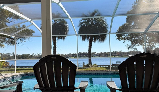 Lakefront home with heated pool minutes from Legoland