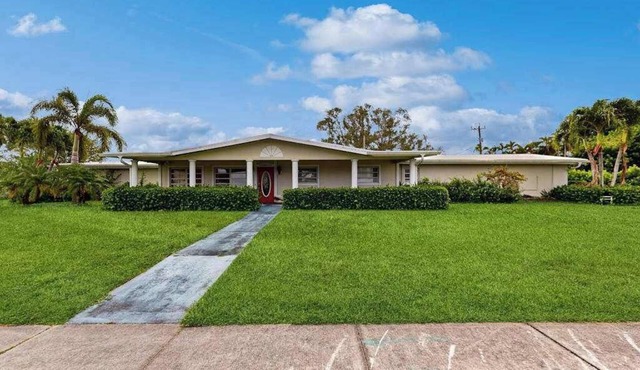 Luxurious single-level retreat w/indoor pool, game room, and modern comforts