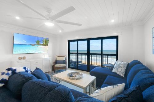 Luxury direct oceanfront corner with large private balcony, heated pool and garage in Ormond Beach