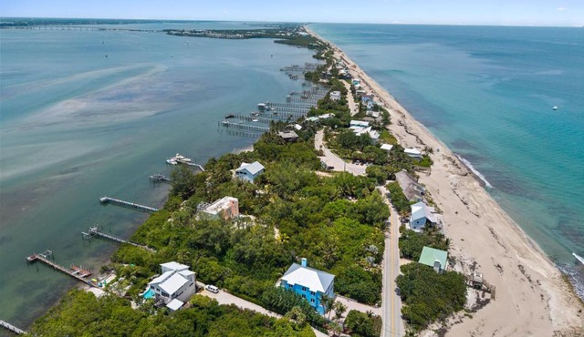 Mermaid Cove - Beach-to-River Retreat with Pool, Hot Tub, Private Dock, Boat Lift in Stuart