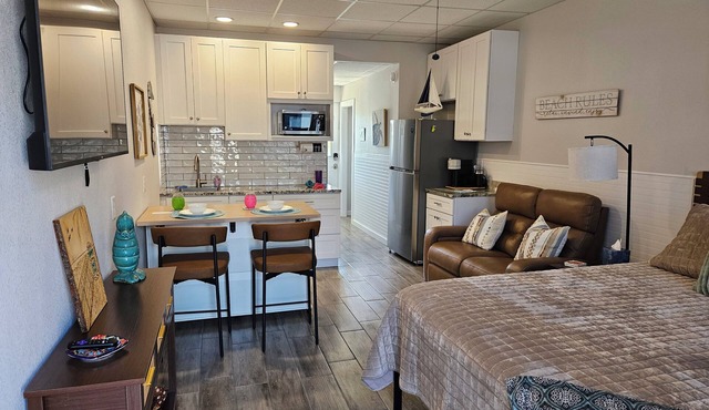 Modern Waterfront Studio: Steps to Beach, Pet - Friendly, Docks & Pool!