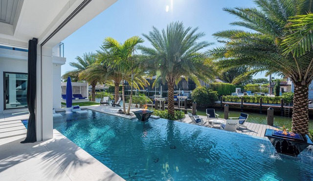 NEW! Amazing Modern Waterfront Luxury at its Finest! Features 4 bedrooms n