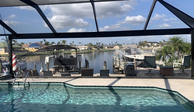 Orchid Lighthouse Canal Pool home with New waterfront Patio!
