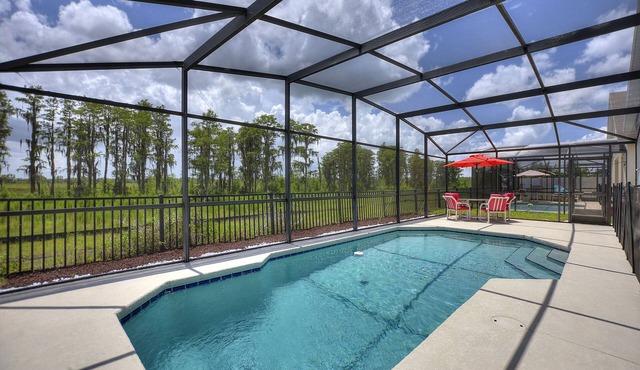 Pet friendly Pool Home with King suite 10 minutes to Disney World