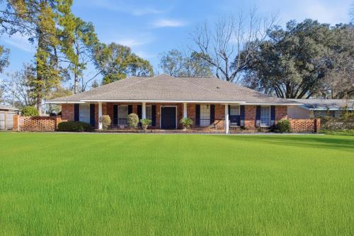 Rustic Retreat 5-BR Home with Backyard Oasis