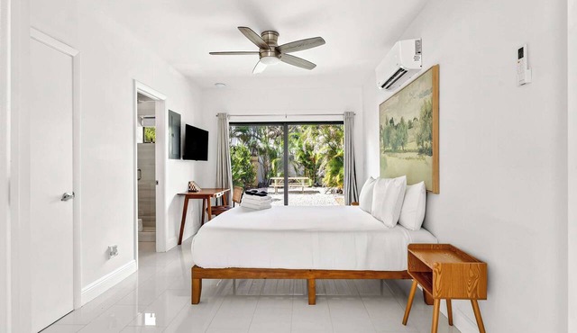 Sleek Kitchenette & Queen Bed