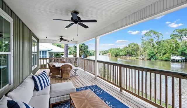 Sleeps 12! Have a great time on the River with big porch and pier on the water!