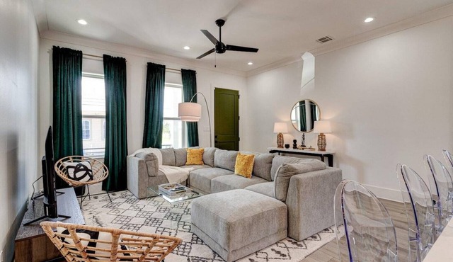 Spacious 5BR Mid-City home with Superdome views, balcony & parking. Steps to parade & streetcar.