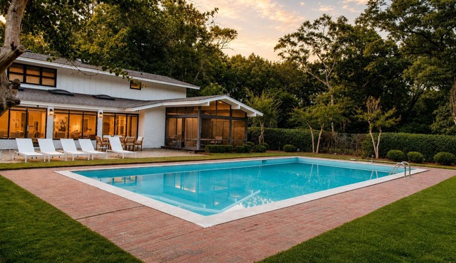Spacious 7BR home featuring a private pool, separate pool house, game room, Peloton-equipped workout sunroom, dedicated office, multiple living areas, and a fully equipped kitchen—perfect for families, groups, and extended stays. in Montgomery