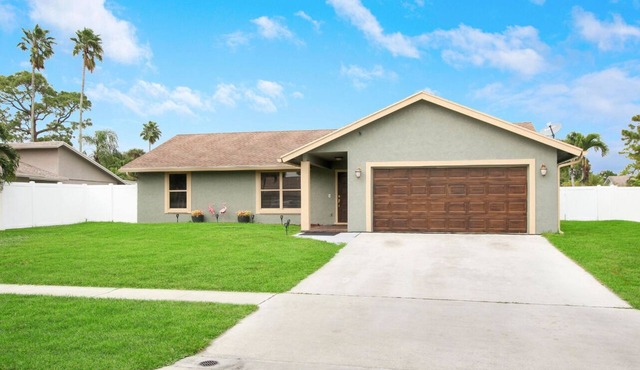 Spacious Family Retreat Near Wellington & West Palm with Private Fenced Yard