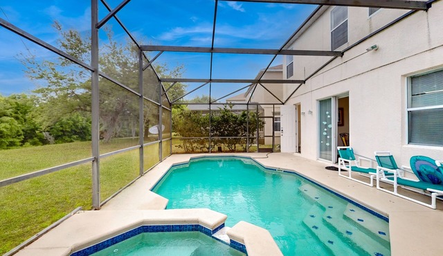 Spacious home with screened private pool/spa, & game room - near theme parks