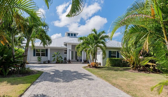 Spectacular Waterfront Pool Home With Expansive Sundeck & Boat Dock Area