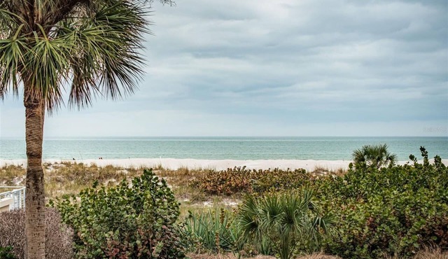 Stunning 2+ St. Pete Beach condo directly on the sand.