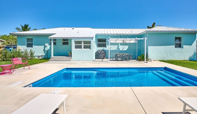 Stylish 4BR Retreat w/Heated Pool & Lush Yard Close to Downtown Delray Beach in Delray Beach