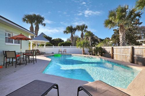 Beach house & backyard oasis with private pool - short walk to beach