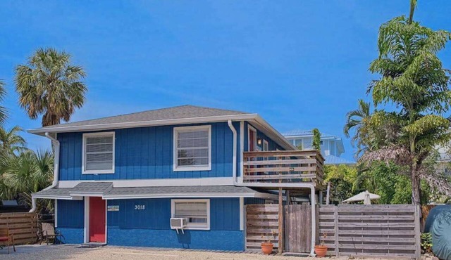 Villa near the beach with a spacious yard, kitchens, & washer-dryer