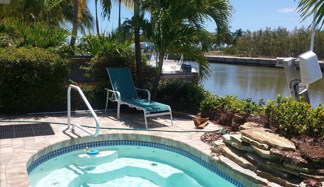 Waterfront, dock, easy ocean access, heated pool, walk to beach! Great location!