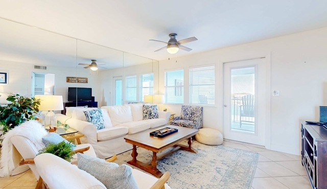 Waterfront, gulf view condo by beach with pool, dock & balcony