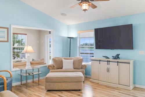 Waterfront St Johns River near springs with boat dock and water sports