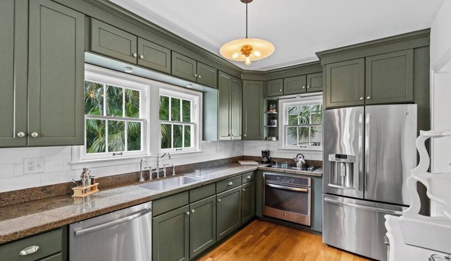 Welcome to this exquisite home with charm and natural light in West Palm Beach