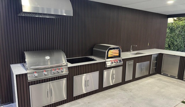 Welcome to Your Luxurious Retreat With A Resort Style outdoor Kitchen and pool!