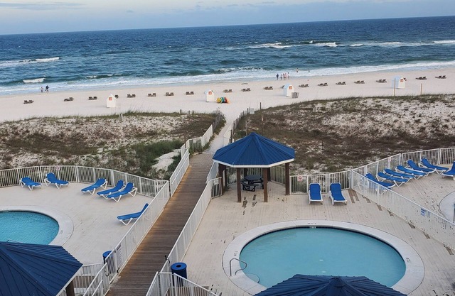 Cozy Beach Condo with Private Beach, heated pool, High Speed WiFi, and More.