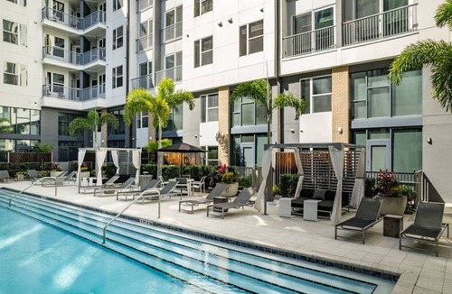 Central Business District Apartment | Virelli Apartments Upscale King Suite in the Heart of Orlando w Pool