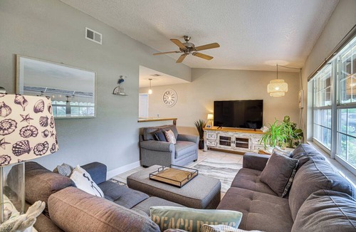 Surfside Estates Cottage | Lovely Merritt Island Home w/Kayak + Fire Pit!