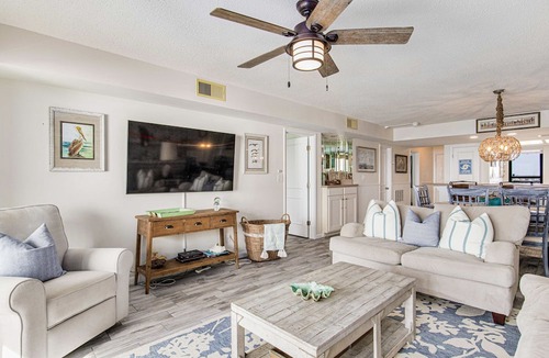Orange Beach East Condo | Orange Beach Gulf-View 2BR Sleeps 5 65" TV High-Top Chairs Pools Boats
