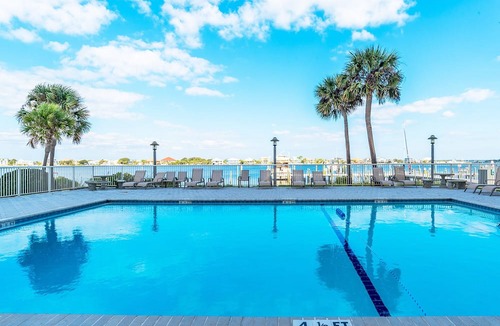 Villa Sabine Condo | Sabine Yacht & Racquet #2B | Bayfront, Pool Views!