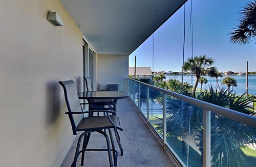 Villa Sabine Condo | Sabine Yacht & Racquet #2B | Bayfront, Pool Views!