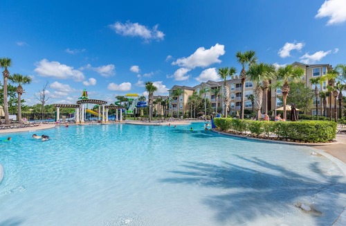 Windsor Hills Condo | Palm Tree Paradise! Bright Tropical Fun with “Frozen” Bedroom - 3 mi from WDW