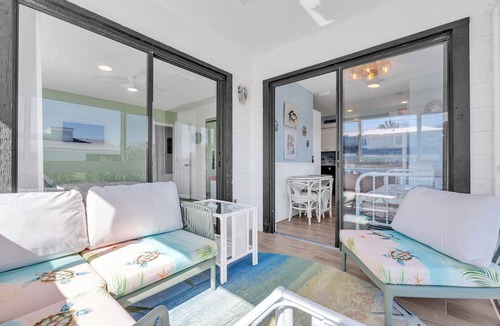 Holmes Beach Condo | Sandy Cheeks & Barefeet, Gorgeous interior Gulf beach Place, pool, on beach side