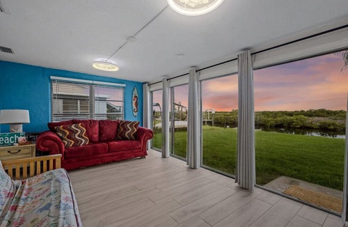 Port Richey Apartment | Waterfront! 2BR w/Firepit & Grill!