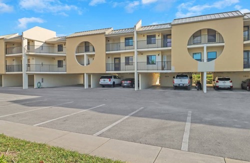 Mid Island Condo | Peaceful Lagoon-Front Condo Community, South of Mid-Island! Heated Community Pool, Free Parking!