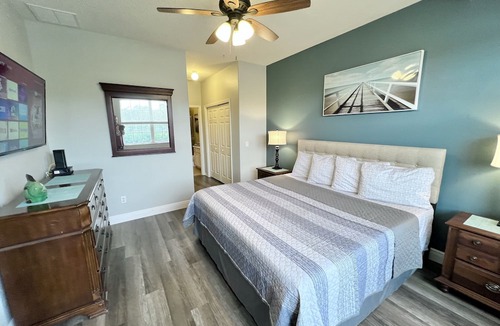 West Kissimmee Condo | Oakwater Resort, Two Miles to Disney, Lake View, Relax in our Hot Tub and Pool!