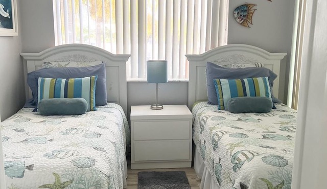 Canal side location with beach & pool club membership!
